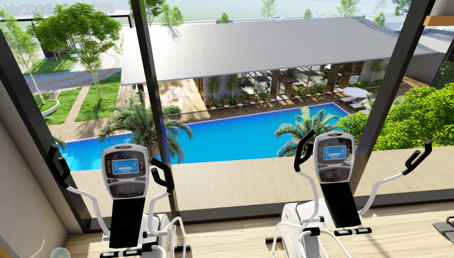 Anderson Residences gymnasium overlooking pool